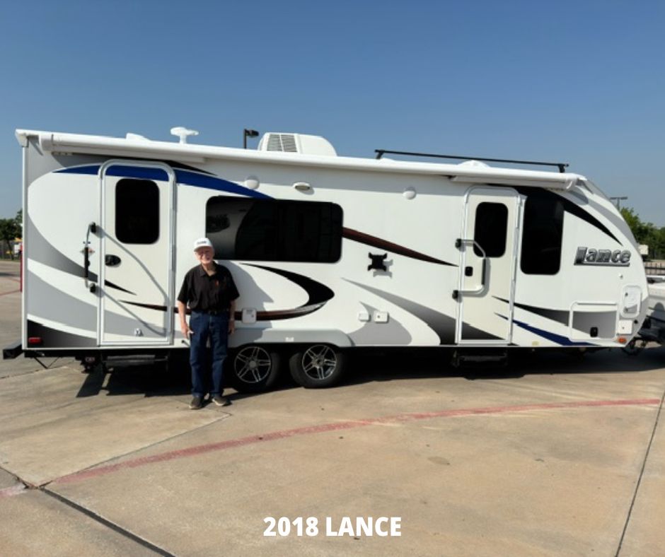 2018 Lance Trailer with happy owner standing in front