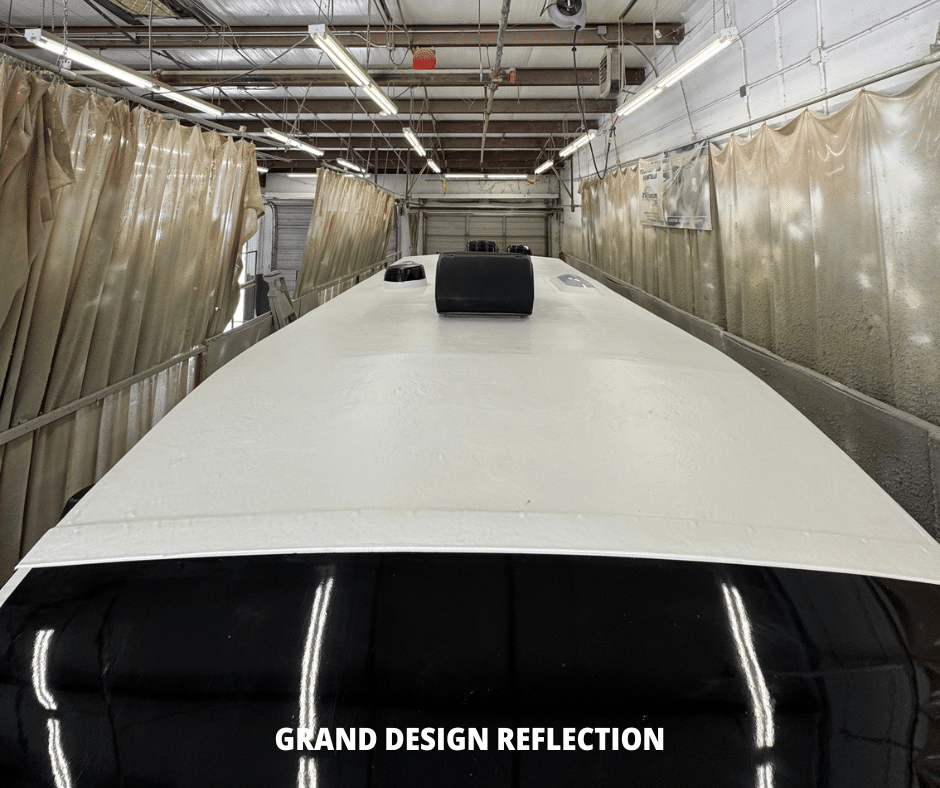 clean white rv roof with air conditioner, vents and skylights